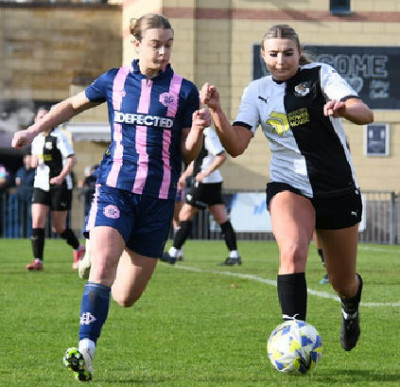 2023-2024 v Dulwich Em W midfield tussle.jpg